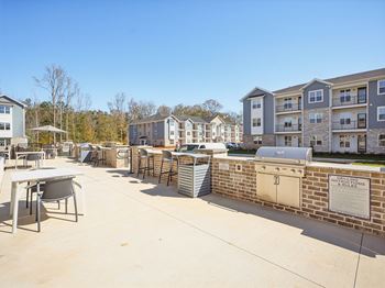 Outdoor grill with intimate seating area